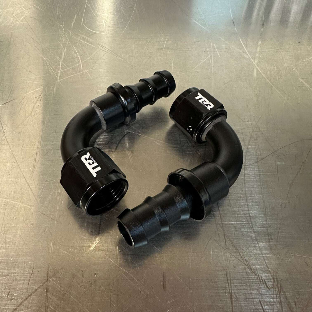 TPR Industry 10an Push Lock Fitting - 90º